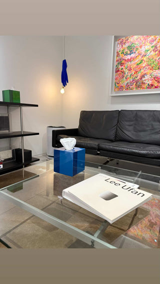 Rhapsody Blue lacquer tissue case on a glass coffee table